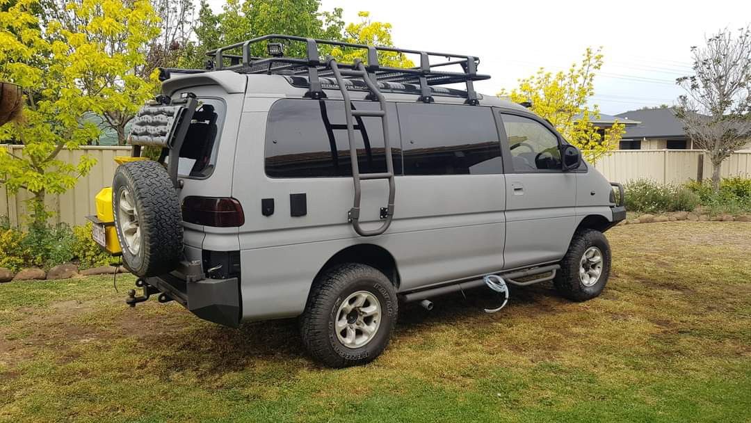 Delica mitsubishi transformed curbed 4x4 campervan Mitsubishi Delica Space Gear camper van conversion guide